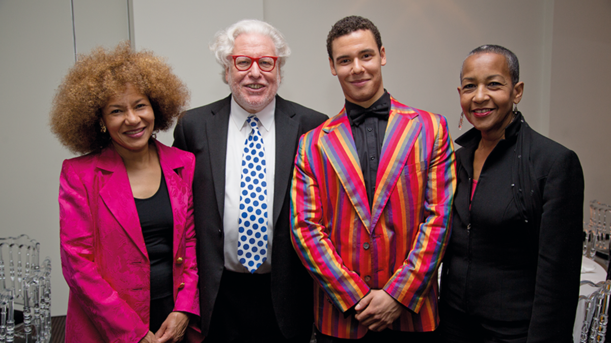 Simon Albury poses with wife Phillida and son David, as well as Marsha Hunt