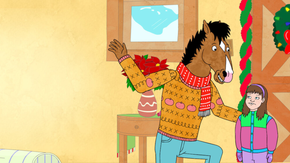 In a still from animated show BoJack Horseman, BoJack (an anthropomorphic horse) crouches down to talk to Sarah, a child with two buck teeth. BoJack is wearing an orange festive jumper and red and white scarf, whereas Sarah is in a bright green and pink jacket