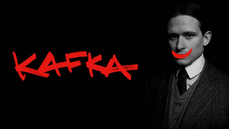 A black-and-white Kafka looks into the camera, a red smile painted over his face, with the word "KAFKA" written in red text to the left