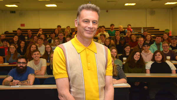 Chris with students behind (Credit: Bournemouth University)