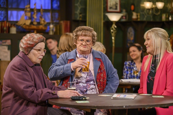 Mrs Brown at table with Winnie McGoogan and Cathy 