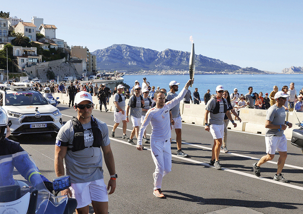 The 2024 Olympic torch ceremony visits a coastal town