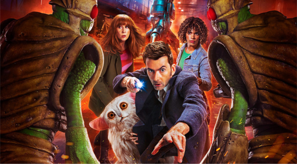 The Doctor, played by David Tennant, looks into the camera, with Donna Noble and Rose Noble stood behind him. The white, fluffy alien Beep the Meep clutches the Dcotor's jacket. They are flanked on either side by two insectoid Wrarth Warriors  