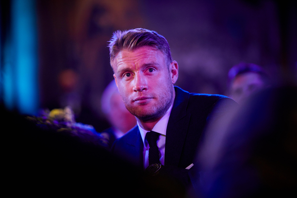 A headshot of the former England cricketer Freddie Flintoff wearing a suit