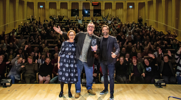 Russell T Davies with Gethin Jones (right) and Judith Winnan (left), who presented him with his RTS Fellowship (Credit: Aaron Lowe Photography)