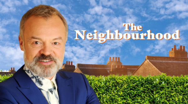 Graham Norton, a white man in his sixties with a white beard, stands next to a fence and brick houses, with text reading "The Neighbourhood" superimposed above