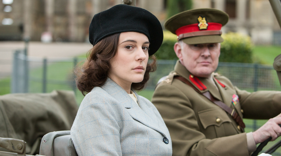 Kathy Griffiths (Phoebe Fox) and Brigadier Wainwright (Robert Glenister) in Close to the Enemy (Credit: A Rogers/ BBC/Little Island Productions)