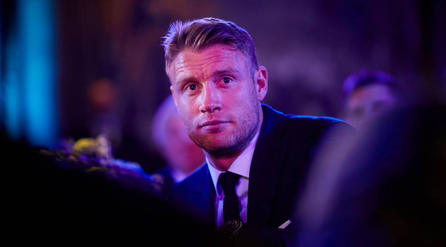 A headshot of the former England cricketer Freddie Flintoff wearing a suit