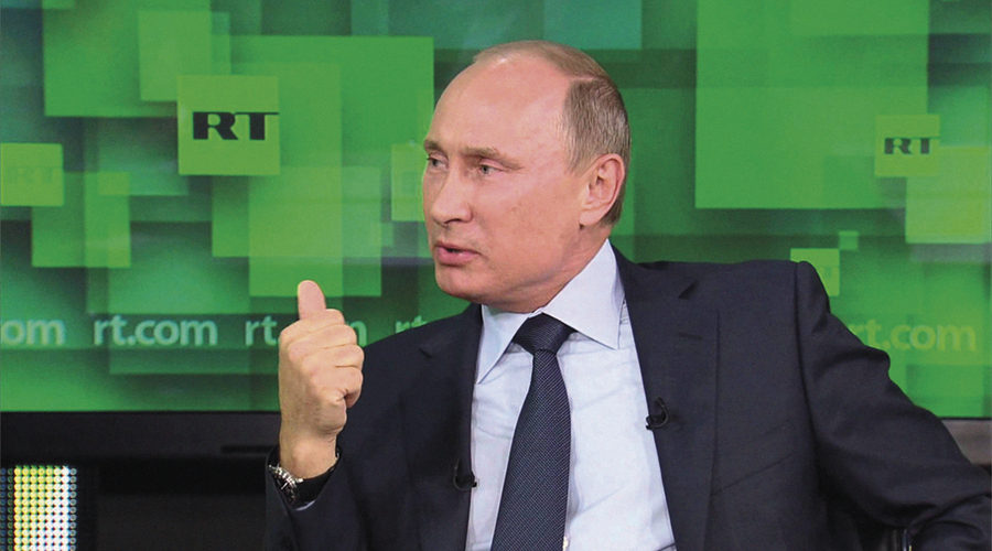 Russian Federation President Vladimir Putin interviewed on RT in June 2013 (Credit: RT)