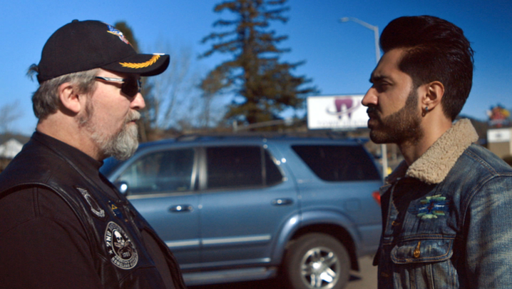 Mobeen Azhar with a member of a far-right group in Oregon (Credit: BBC/Expectation Entertainment Ltd)