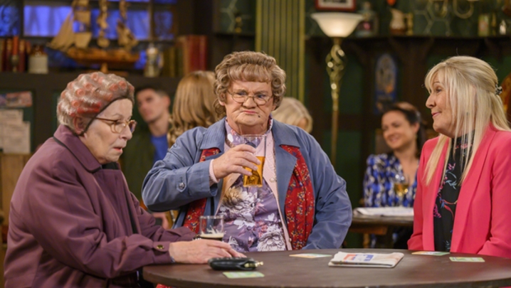 Mrs Brown at table with Winnie McGoogan and Cathy 