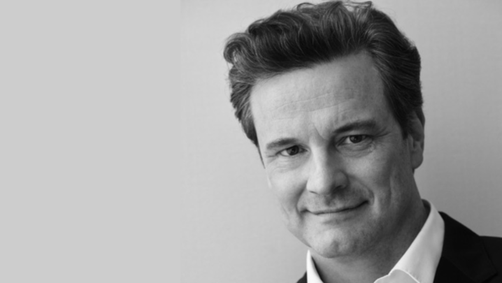 A black and white headshot of Colin Firth