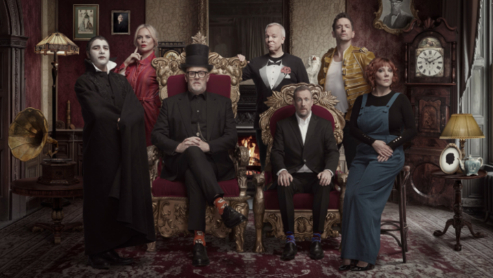 Alex Horne and Greg Davies sit with the contestants of the new series of Taskmaster