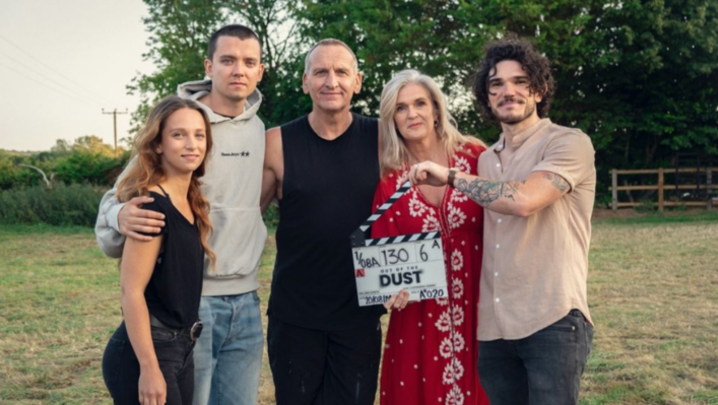 Molly Windsor, Asa Butterfield, Christopher Eccleston, Siobhan Finneran and Fra Fee stand outdoors, arm in arm, with Siobhan and Fra holding a clapperboard