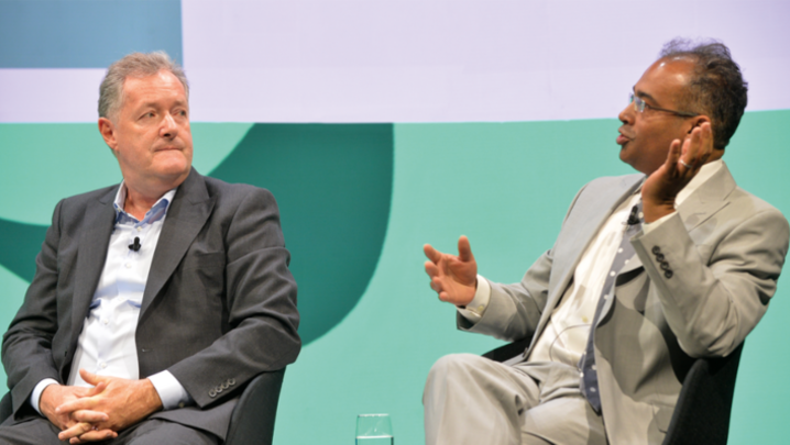 Piers Morgan and Krishnan Guru-Murthy sit next to each other in conversation at the RTS Cambridge Convention 2023