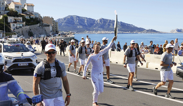 The 2024 Olympic torch ceremony visits a coastal town