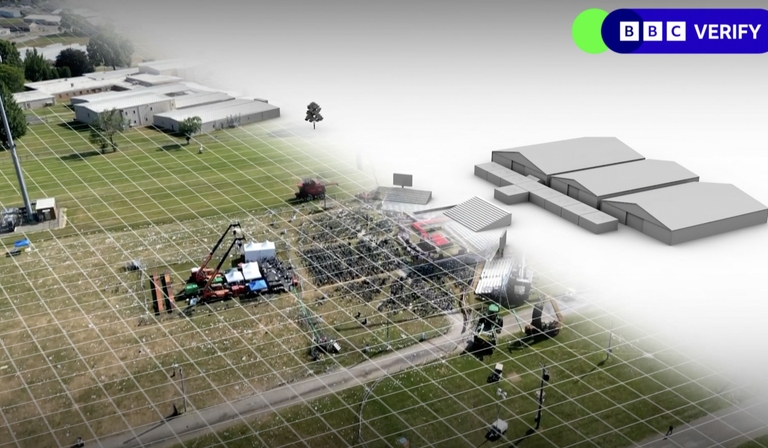 A CGI landscape, which becomes simpler and simpler from left to right, until all that remains are grey models of buildings against a white backdrop. The BBC Verify logo is superimposed above in the top right corner