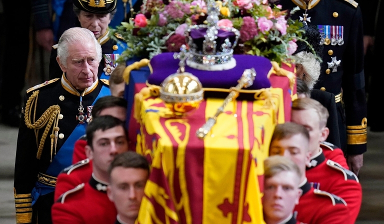 Prince Charles with pallbearers