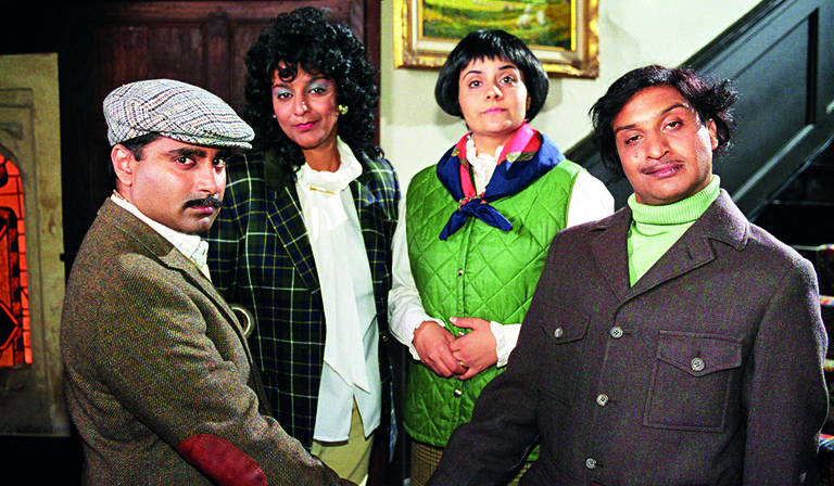 The cast of Goodness Gracious Me stand in a circle, from left: Sanjeev Bhaskar, Meera Syal, Nina Wadia and Kulvinder Ghir