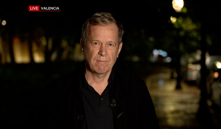 Andrew Harding delivers a piece to camera, text reading "LIVE VALENCIA" in the upper right corner