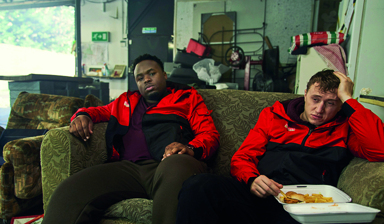 Joshua (Samson Kayo) and Ricky (Theo Barklem-Biggs) in Sliced (Credit: UKTV)