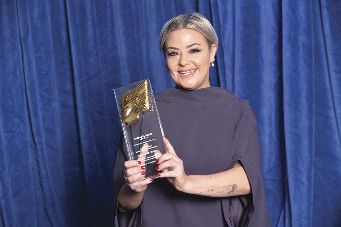 Lisa Armstrong returns to work in Louis Vuitton face mask and